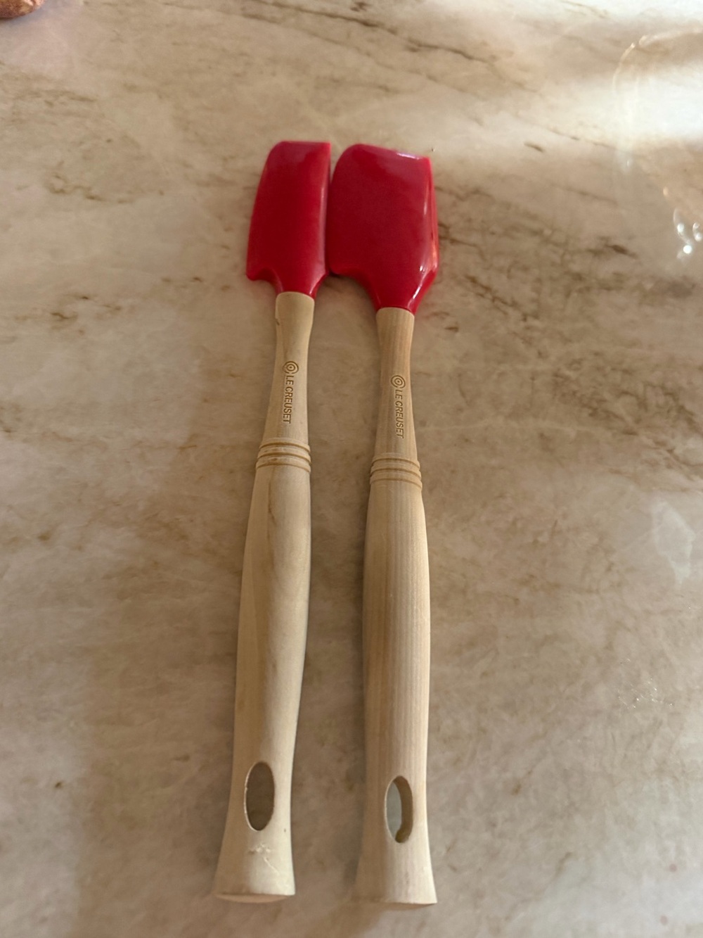 Le Creuset silicone mixing spatulas in Cerise (red)